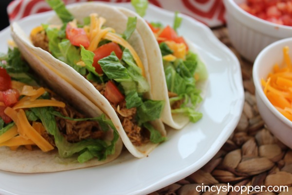 Slow Cooker Chicken Tacos - easy weeknight dinner idea. Loads of flavor.