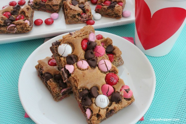 Valentine Blondie Bars- Loaded with Chocolate Chips and Valentine colored M&M's perfect for Valentine dessert!
