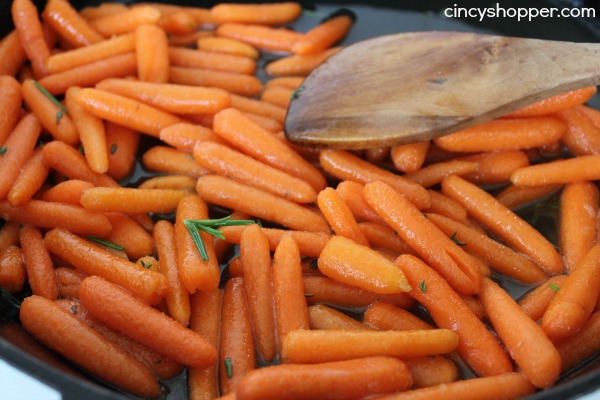 Honey Glazed Carrots Perfect for a Thanksgiving, Christmas or any day side dish. Lots of great flavors of honey, brown sugar, butter, and thyme!