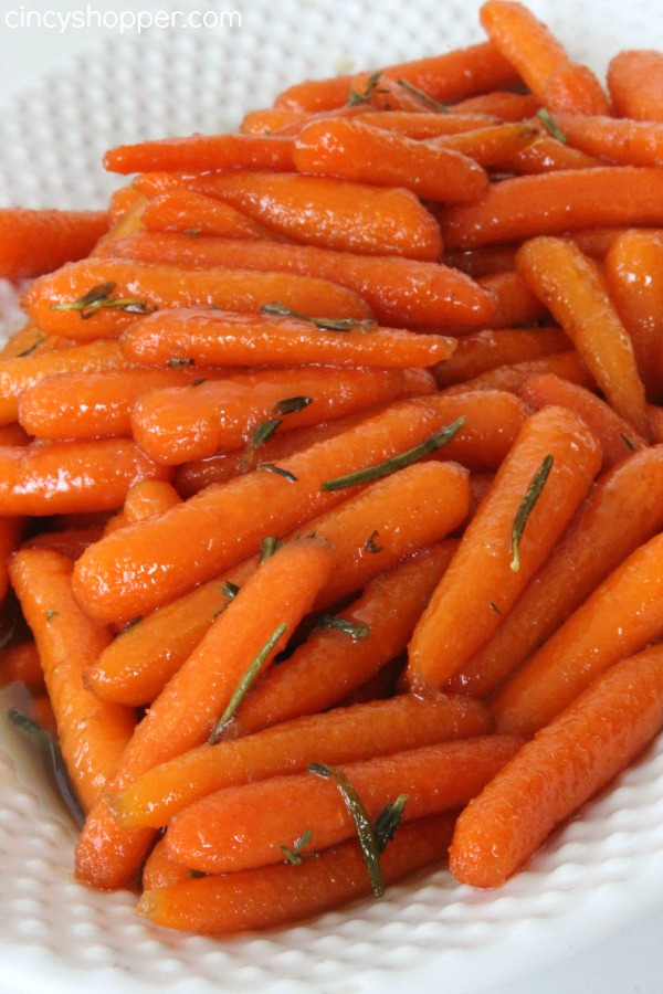 Honey Glazed Carrots Perfect for a Thanksgiving, Christmas or any day side dish. Lots of great flavors of honey, brown sugar, butter, and thyme!