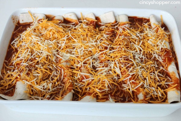 Easy Beef Enchiladas- Enjoy a Mexican Dinner at home in no time at all.  Full of great flavor and smothered with cheese
