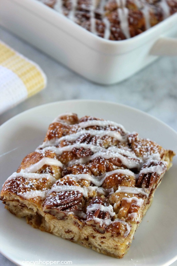 Cinnamon Roll French Toast Casserole- Yup, your store bought cinnamon rolls meet up with French Toast in a gooey breakfast casserole that everyone will enjoy.