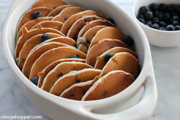 Blueberry Pancake French Toast Casserole- Blueberry Pancakes meet French Toast in this awesome breakfast dish!