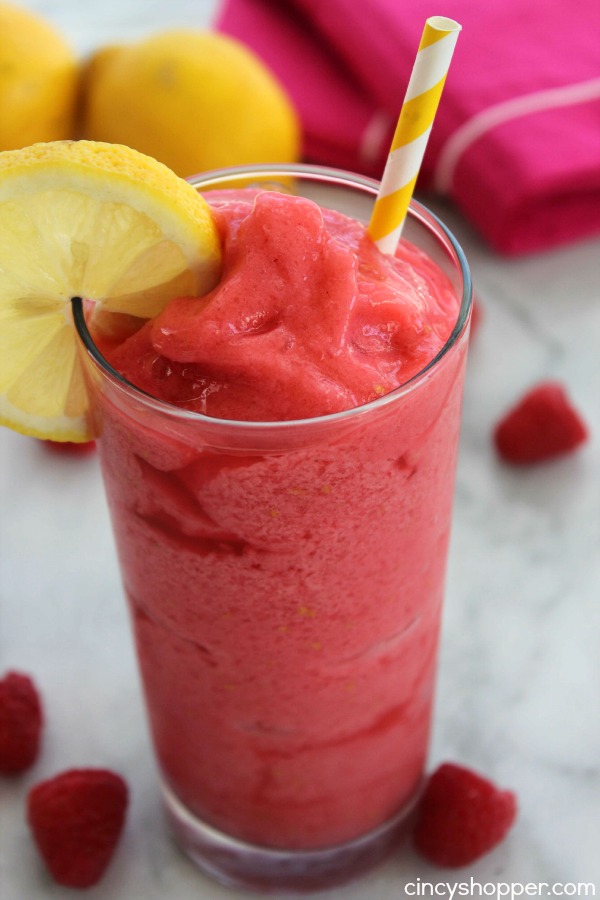 Raspberry Lemonade Slushies- The most refreshing summer time frozen treat. Just a couple fresh ingredients to make these slushies full of great flavor. Perfect for summer time parties.