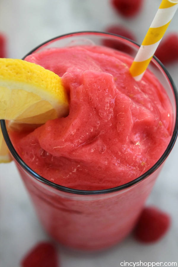 Raspberry Lemonade Slushies- The most refreshing summer time frozen treat. Just a couple fresh ingredients to make these slushies full of great flavor. Perfect for summer time parties.