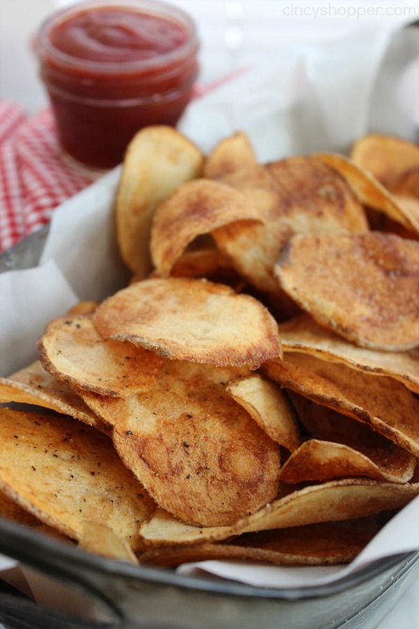 Homemade Potato Chips Recipe. Pair these garlic salt and pepper chips with some Sriracha Ketchup and you have one heck of a snack or side dish for your meal.