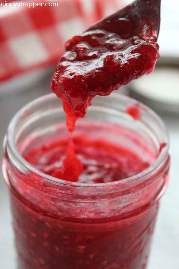 No Cook Raspberry Freezer Jam- Super Simple. Ready in just a few minutes time. Great on PB&J, Biscuits, etc. So Much better than store bought!