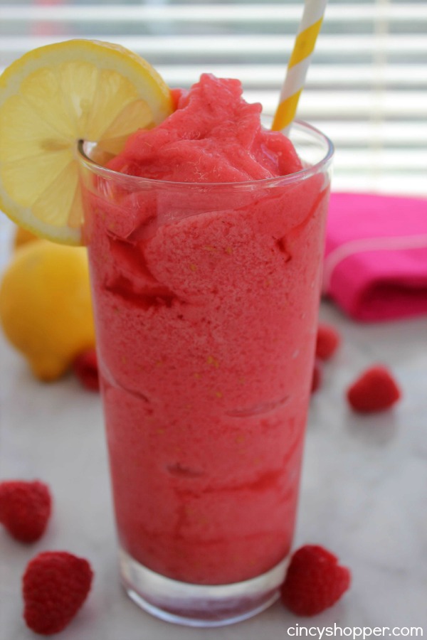 Raspberry Lemonade Slushies- The most refreshing summer time frozen treat. Just a couple fresh ingredients to make these slushies full of great flavor. Perfect for summer time parties.