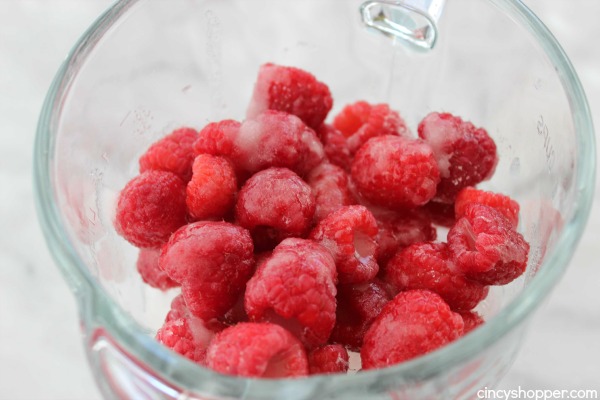 Raspberry Lemonade Slushies- The most refreshing summer time frozen treat. Just a couple fresh ingredients to make these slushies full of great flavor. Perfect for summer time parties.