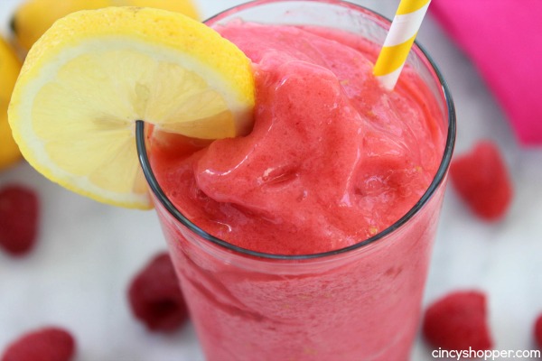 Raspberry Lemonade Slushies- The most refreshing summer time frozen treat. Just a couple fresh ingredients to make these slushies full of great flavor. Perfect for summer time parties.