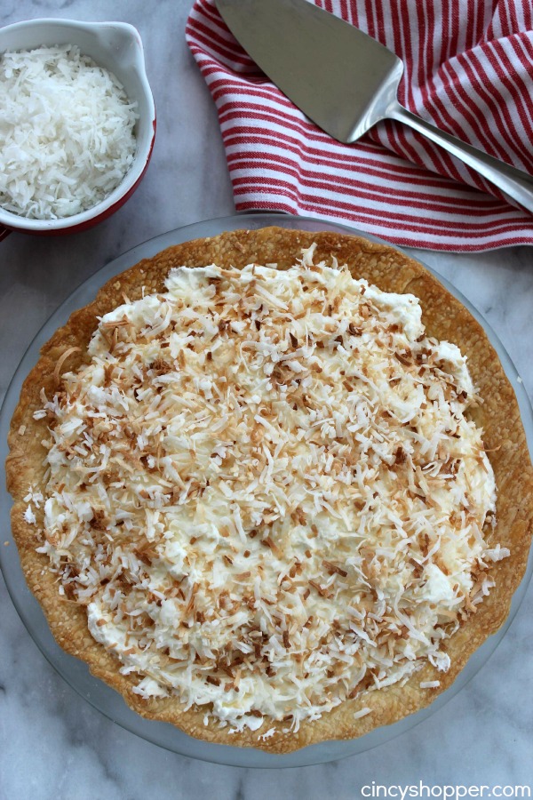 Coconut Cream Pie- Super Simple Pie- Starts with a store bought crust. Then topped with the most delish coconut cream filling and topping. 