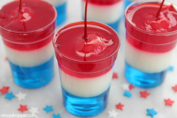 These Red, white, and blue 4th of July Firecracker Jell-O Cups will be the hit at your Independence Day celebrations. Super simple layers of Jell-O in small cups with a cherry on top to resemble a firecracker.