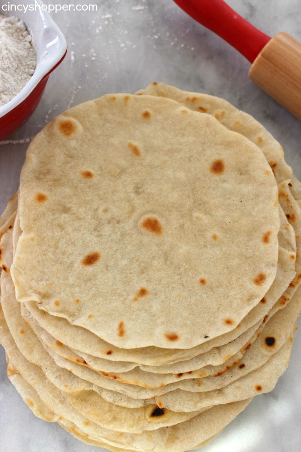 Homemade Flour Tortillas Easy and Super Inexpensive. Require just a few ingredients from your pantry. Great for taco night, breakfast tacos and after school snacks.