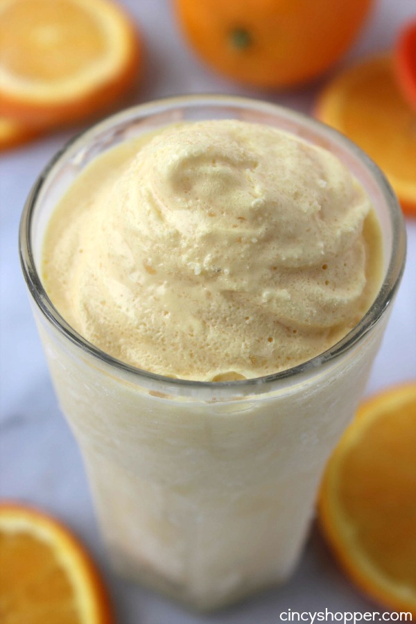 Copycat Orange Dole Whip- No trip to Disney Needed. This cold treat is non-dairy and includes great orange juice flavors. Perfect summer time dessert that is super refreshing