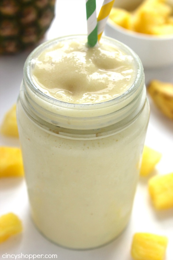 Caribbean Slush - loaded with pineapple, banana, and coconut flavors that are sure to keep you refreshed this summer. Super simple beverage that is great for hot summer days.