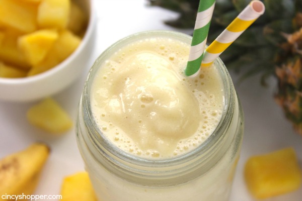 Caribbean Slush - loaded with pineapple, banana, and coconut flavors that are sure to keep you refreshed this summer. Super simple beverage that is great for hot summer days.