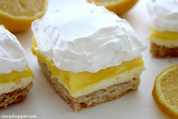Lemon Lush Bars- Delicious Layered dessert. Super simple and tastes AMAZING! Great summer dessert.