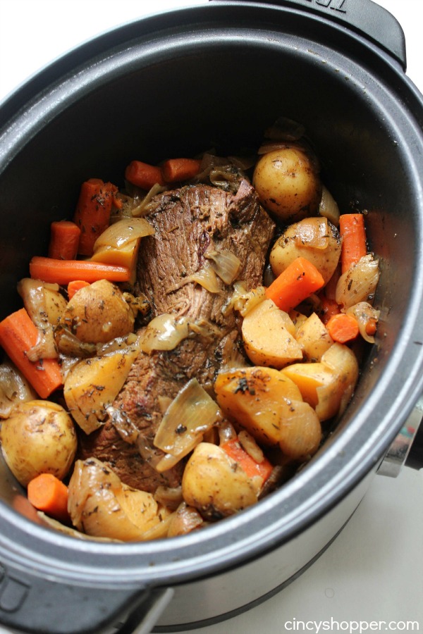 Slow Cooker Pot Roast -Roast loaded with potatoes, carrots, and onions is an easy Crock-pot idea that makes for a filling meal. Juicy meat with incredible flavors.