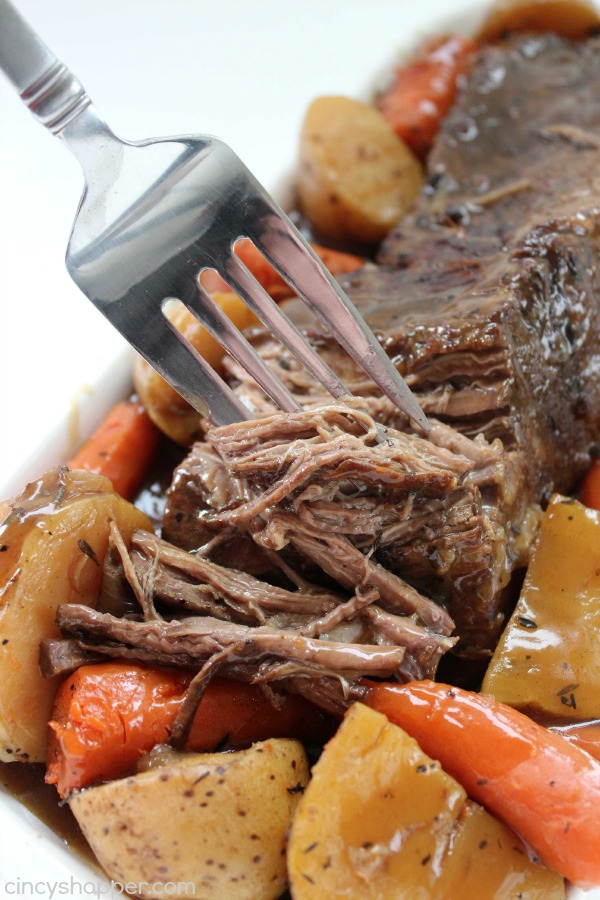 Slow Cooker Pot Roast -Roast loaded with potatoes, carrots, and onions is an easy Crock-pot idea that makes for a filling meal. Juicy meat with incredible flavors.