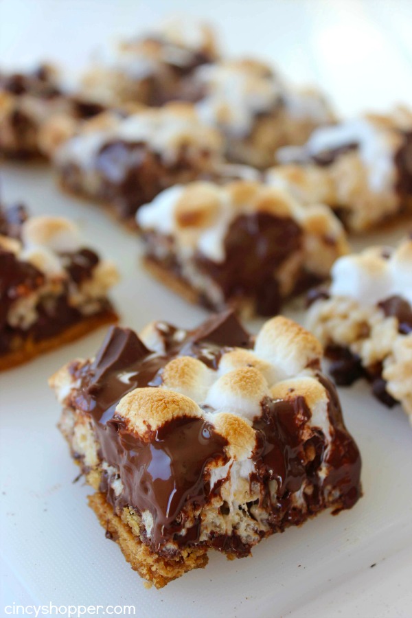 S'Mores Krispie Treats -Perfect treat. Graham cracker crust, then topped with krispie treat, marshmallows ,and loads of chocolate. Super messy and super yummy. 