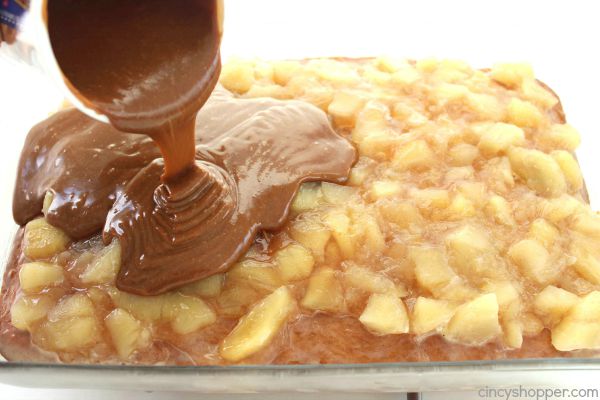 Caramel Apple Poke Cake -loaded with great cinnamon, apples and caramel. Perfect for serving at your next fall potluck.