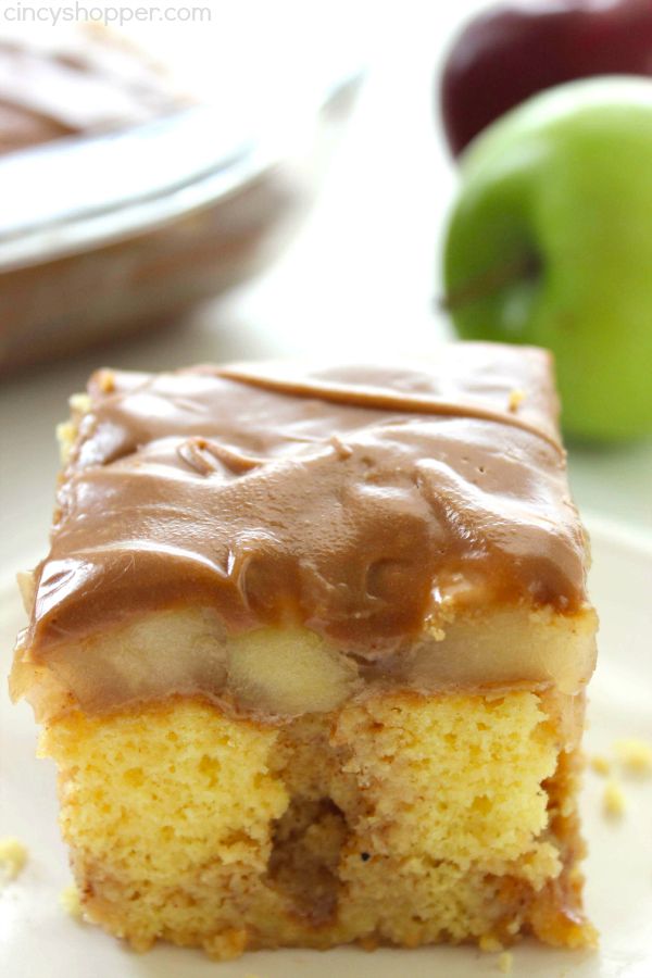 Caramel Apple Poke Cake -loaded with great cinnamon, apples and caramel. Perfect for serving at your next fall potluck.
