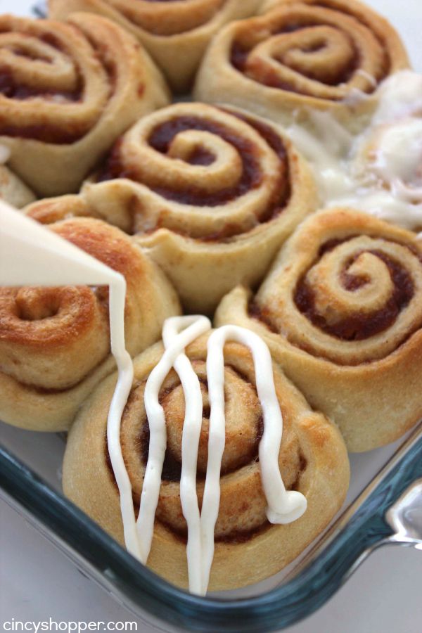 Easy Apple Cinnamon Rolls with Cream Cheese Icing- Since we use store bought crescent sheets, they come together quite quickly. Perfect fall breakfast or dessert.
