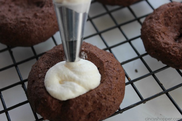 Hot Chocolate Cookies -great Christmas cookie. A chocolate thumbprint cookie topped with marshmallow icing and some chocolate drizzle. Just like a cup of Hot Cocoa