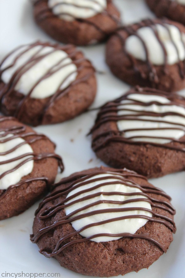 Hot Chocolate Cookies -great Christmas cookie. A chocolate thumbprint cookie topped with marshmallow icing and some chocolate drizzle. Just like a cup of Hot Cocoa