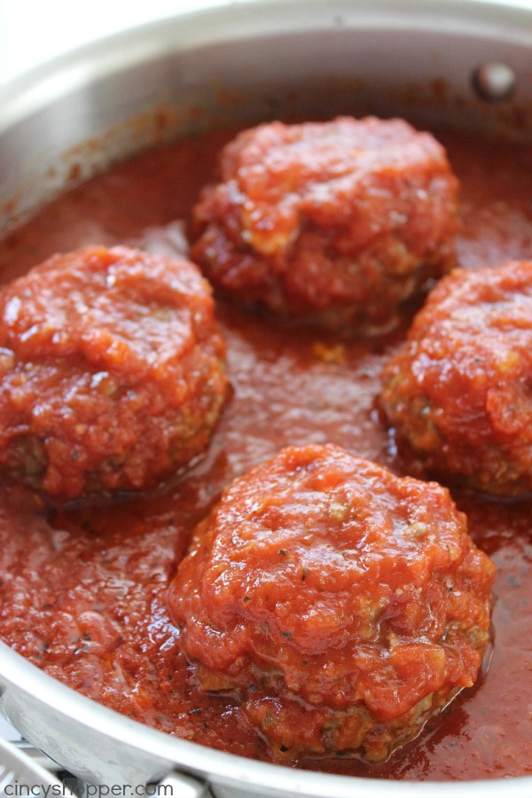 Mozzarella Stuffed Meatloaf Patties - Easy family meal idea. Tomato based sauce is great especially when paired with mashed potatoes. Perfect comfort food.