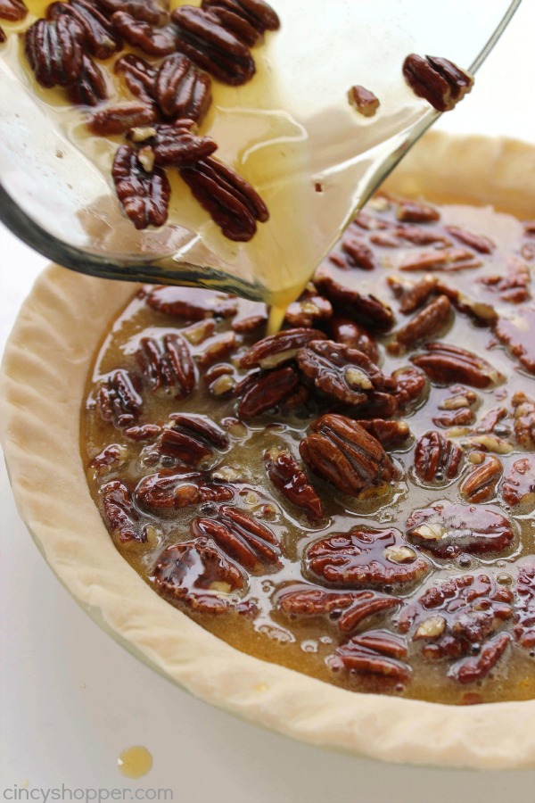 Homemade Pecan Pie - a great addition to your Thanksgiving dinner this year. Super simple and the pie turns out AMAZING!