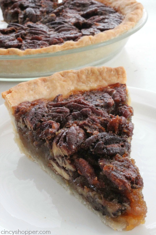 Homemade Pecan Pie - a great addition to your Thanksgiving dinner this year. Super simple and the pie turns out AMAZING!