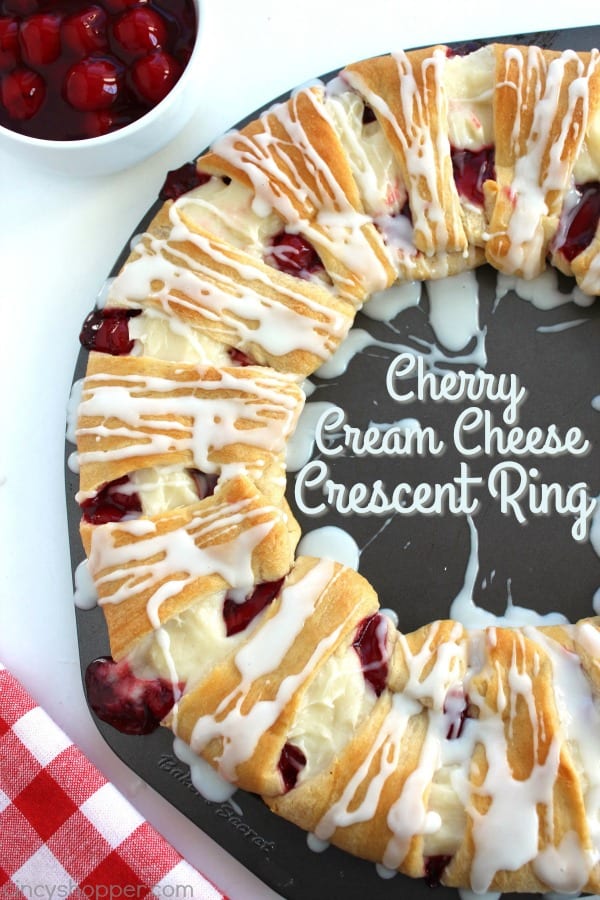 Cherry Cream Cheese Crescent Ring - Super simple, uses store bought crescent rolls. Tastes amazing. If you are feeding a crowd breakfast or even dessert, this danish ring is going to be perfect.