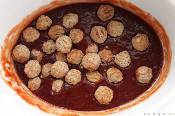 Slow Cooker Cocktail Meatballs - Sweet with a little bit of spicy kick. Make for a perfect party appetizer. Made right in your Crock-Pot!