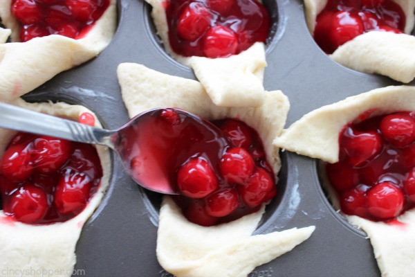 Cherry Pie Bites - made with store bought crescent rolls, they can be made in a jiffy. Perfect for breakfast or even dessert.