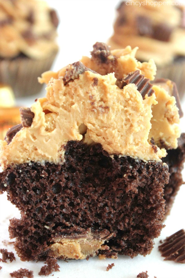 Reese's Peanut Butter Cupcakes - simple chocolate cupcake stuffed with a Reese's Miniature then topped with a creamy peanut butter frosting.