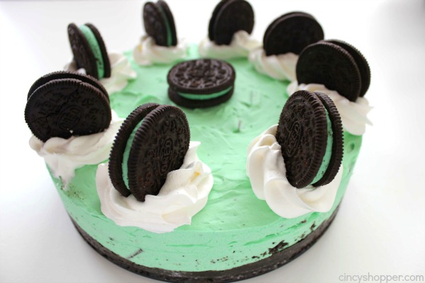 No Bake Mint Oreo Cheesecake - perfect St. Patrick’s Day dessert. Mint fans will love the crushed Mint OREO cookie crust, minty cheesecake filling with chopped mint Andes candies.