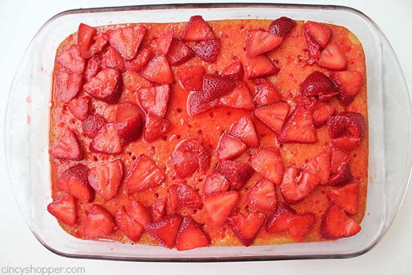 Strawberry Poke Cake A traditional poke cake with the addition of fresh strawberries, more Jell-O and then topped with a layer of Cool-Whip.