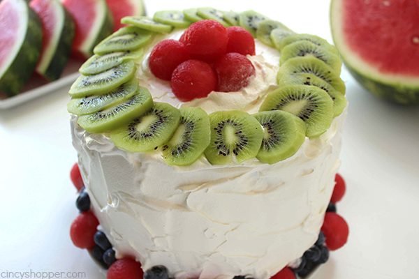 Easy Watermelon Cake - a perfect picnic dessert. With just a watermelon and Cool-Whip you can whip up this tasty summer treat in just a few minutes time.