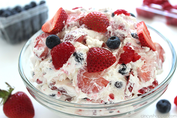 Berry Cheesecake Salad - not your average salad. It is loaded with strawberries, blueberries, raspberries, and great cheesecake flavors. Perfect side dish for summer bbqs or any potluck.