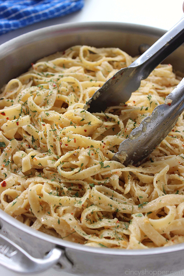 Garlic Parmesan Noodles - perfect side dish with just about any meal. Butter, garlic, noodles, Parmesan, and a few minutes of time needed are all that are needed.