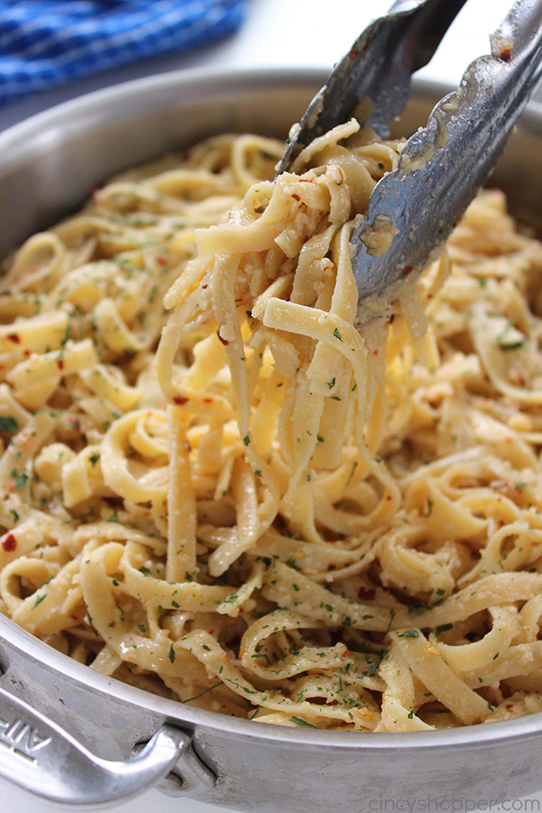 Garlic Parmesan Noodles - perfect side dish with just about any meal. Butter, garlic, noodles, Parmesan, and a few minutes of time needed are all that are needed.