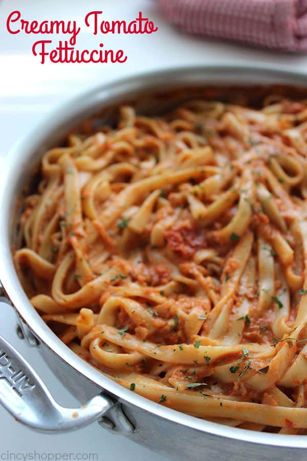 Creamy Tomato Fettuccine - perfect for a dinner side dish or even a meal. The pasta dish is creamy, full of flavor, and so easy to make. My family LOVES it!