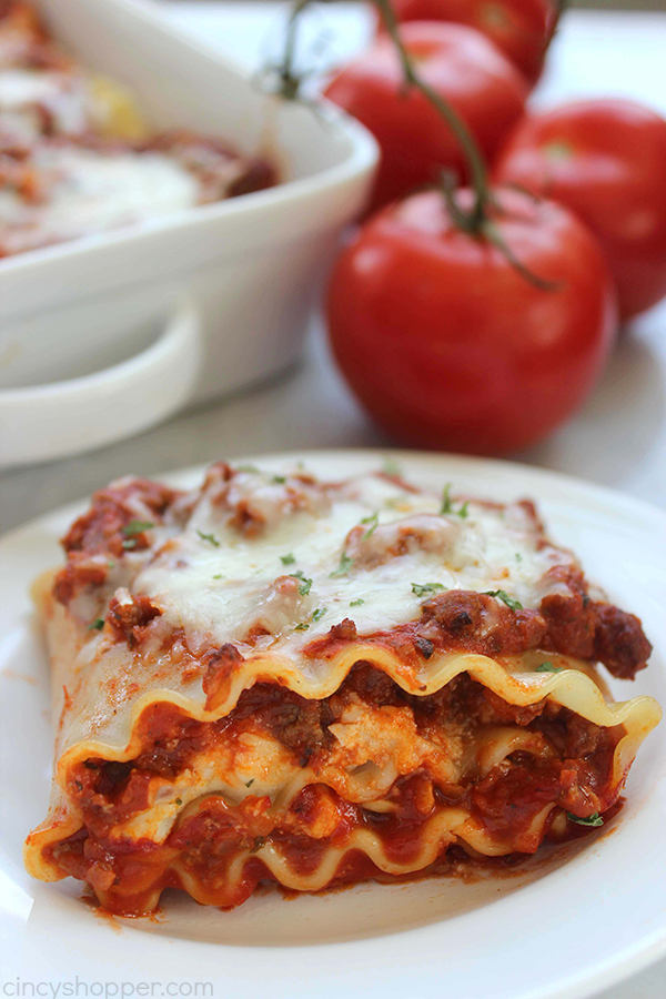 Lasagna Roll Ups - super delicious and easy to make! Great for feeding a large family or a great addition for your next potluck.