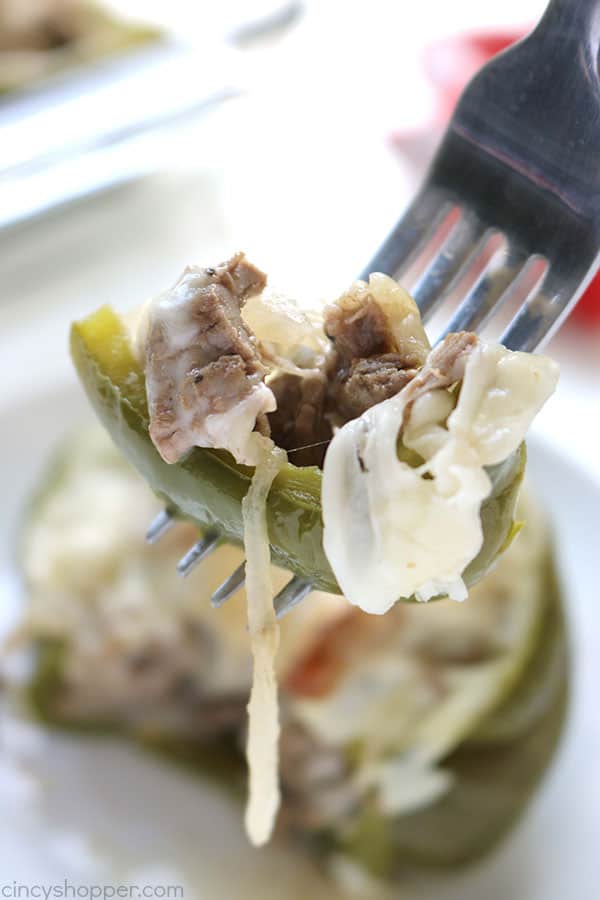 Philly Cheesesteak Stuffed Peppers - super tasty and easy dinner idea. You will find all the flavors you love of a Philly Cheesesteak stuffed right inside of a green pepper.