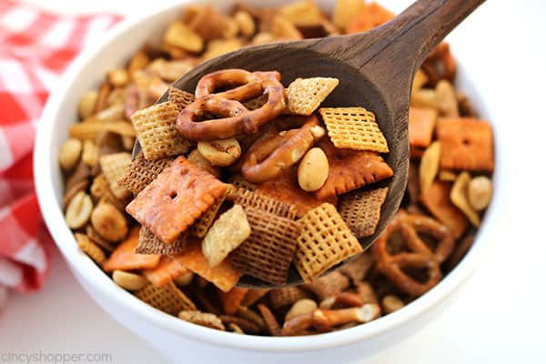 This Slow Cooker Party Mix will perfect for every day snacking, holiday parties, movie nights, and great for Game Day. This stuff feeds a crowd. So simple to make since it is made right in your Crock-Pot.