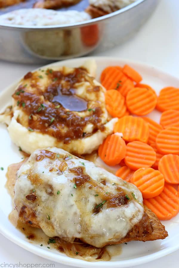 If you are a fan of French onion soup, you will want to make this Simple French Onion Chicken for dinner! We use simple ingredients to load up chicken breasts with amazing onion flavor. #ChickenDinner