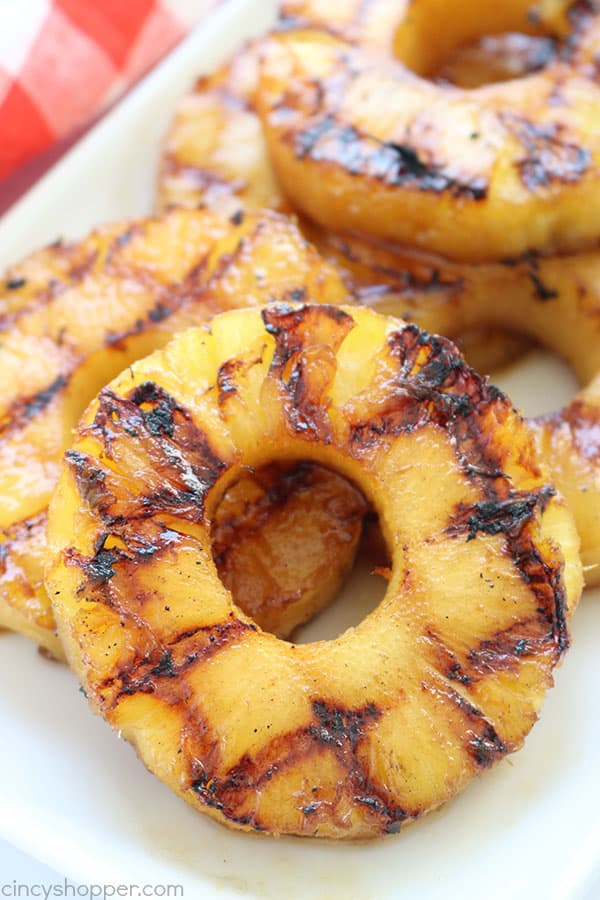 This super easy Brown Sugar Grilled Pineapple will make for a perfect side dish or even a dessert this summer. With just a couple simple ingredients like butter, vanilla, brown sugar, and cinnamon, you can whip it up and toss it on the grill in no time at all!