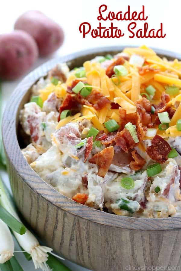 This Loaded Potato Salad will make for a great side dish at your summer picnics and BBQ's. We toss cubed potatoes with the fixings that you would normally find in a loaded baked potato. Lots of cheese, bacon, green onion, and of course sour cream. #SummerSalad