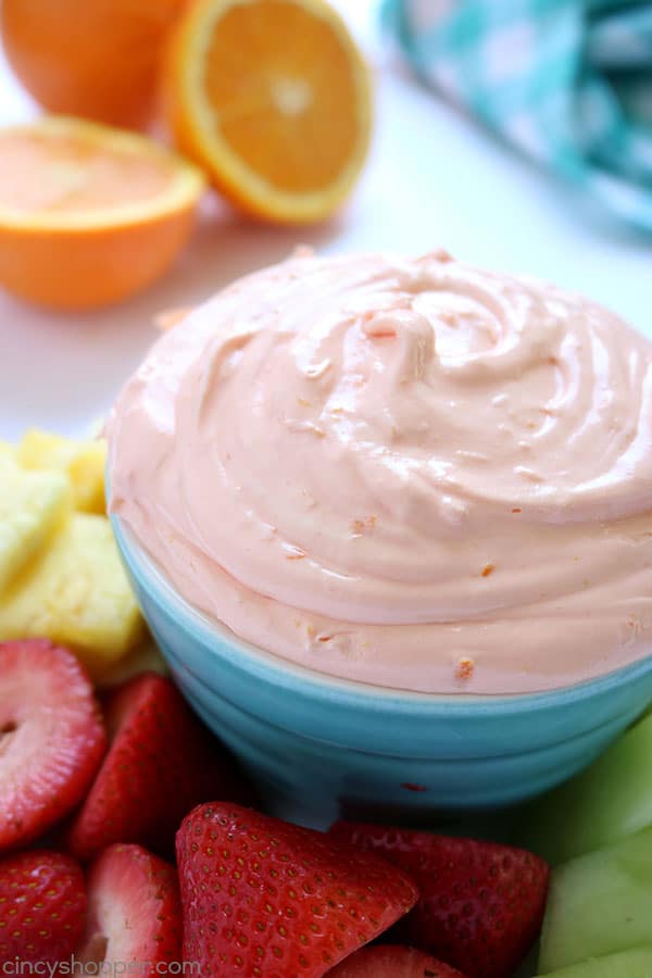 Orange Creamsicle Dip - so refreshing! It goes so well with just about any fruit. Great summer appetizer. Serve it at the pool or for your next summer bbq! #Creamsicle #Dip #OrangeCreamsicle #Summer #Appetizer #FruitDip